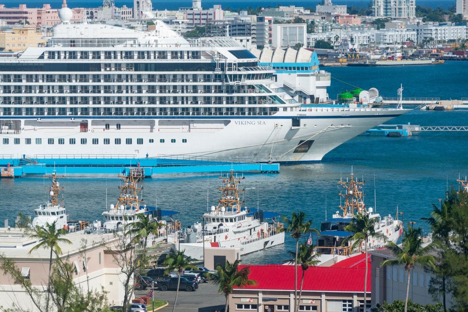 Cruise ship moored at a harbor next to the city